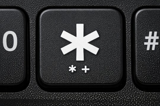 A close-up shot of a keyboard with a white symbol on it
