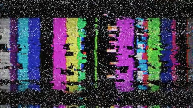 Television static signal distortion displays colorful test patterns with digital noise interference on screen.