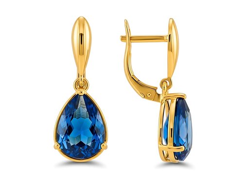 A pair of gold earrings with blue stones