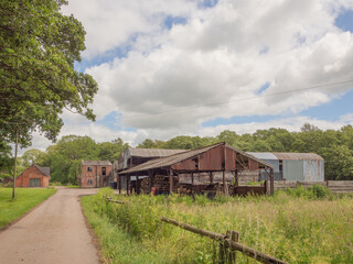 Old traditional farm buildings at Arley Hall, Northwich, Chehsire, UK © Sue Burton