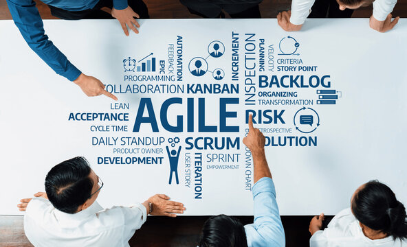 A dynamic scene of professionals actively collaborating on Agile project management techniques, showcasing various methodologies aimed at improving workflow and productivity. Amity