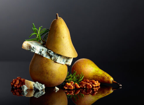 Blue cheese with pear, walnuts, and rosemary.