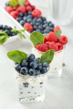 Curd dessert with berries and mint.