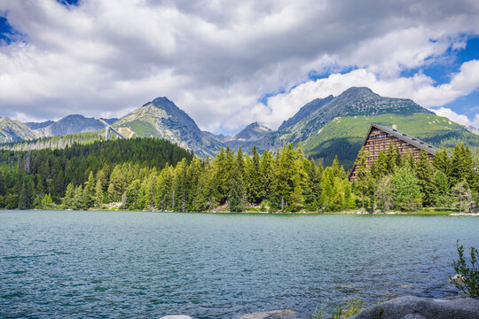 Beautiful view of the calm lake Strbske pleso of glacial origin in National Park High Tatra, Slovakia, Europe.  Lamdmark and popular tourist destination