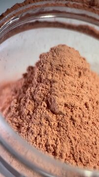 Footage video powder texture close up detail make up and skincare for advertising content