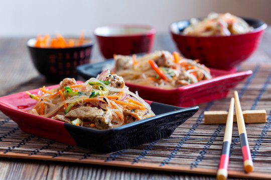 Stir-fried glass noodles with pork.