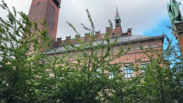 Lur Blowers monument and City Hal against sky, Copenhagen, Denmark