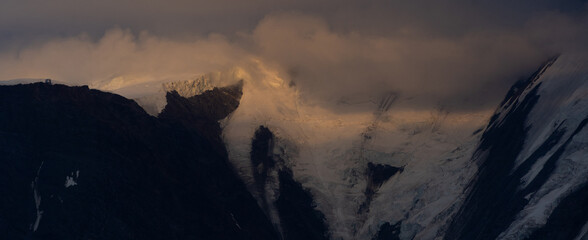 Naklejka premium Summer view of the Mont Blanc massif above forested slopes 