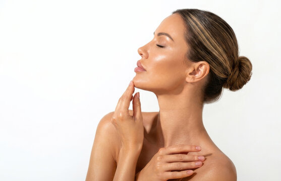 Side profile of a gorgeous woman touching her chin isolated on white background.