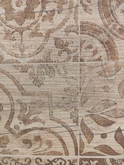 Fototapeta premium Brown vintage ceramic tile pattern background with rustic wood grain texture 