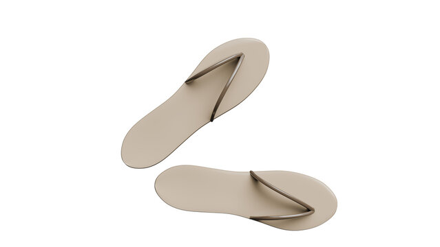 A pair of beige flip-flops isolated on a black background.