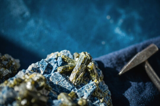 Green tourmaline crystals on blue kyanite matrix
