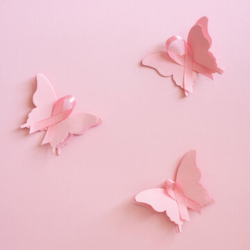 Pink butterfly ribbons on soft pink square background for Breast Cancer Awareness Month support and hope