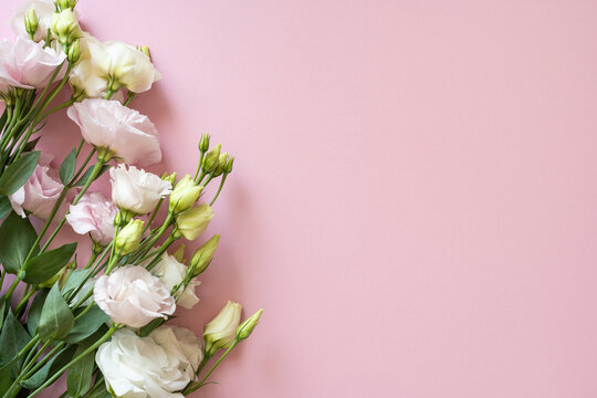 Soft pink lisianthus bouquet on pastel background for birthday, Mother Day, Women's Day