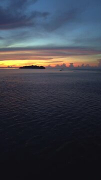 Aerial View of Tropical Sunset Over Ocean