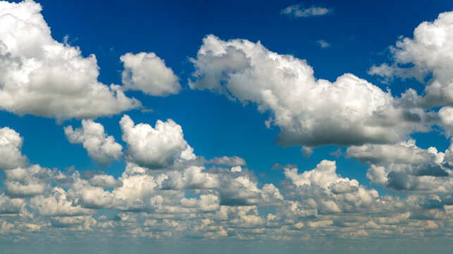 Rain clouds forming on blue Florida sky. Colorful summer skyscape
