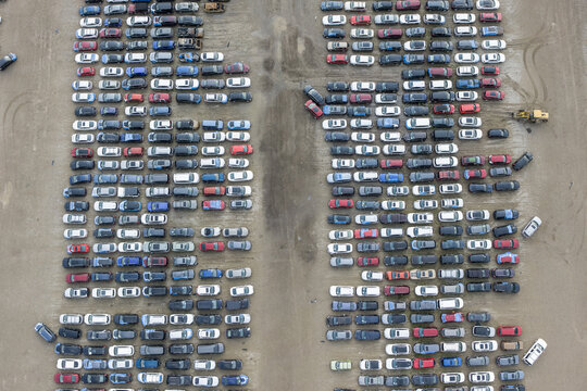 Lansing, United States - 10 August 2026: Aerial view of GM Lansing Delta Assembly featuring rows of parked vehicles in a large industrial lot.