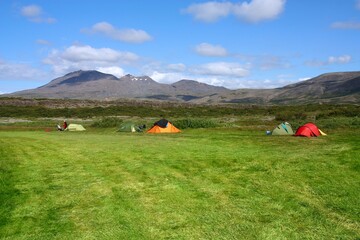 Obraz premium Outdoor vacation adventure. Camping tents at a campground in Thingvellir National Park in Iceland.