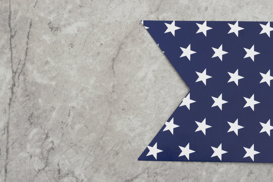 Blue and white star pennant banner on stone for festive events