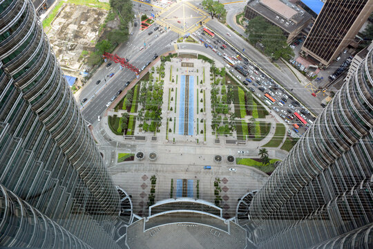 Kuala Lumpur, Malaysia &ndash; December 1, 2015. View from the Petronas Twin Towers Skybridge over Kuala Lumpur, Malaysia. View with modern buildings and street traffic.