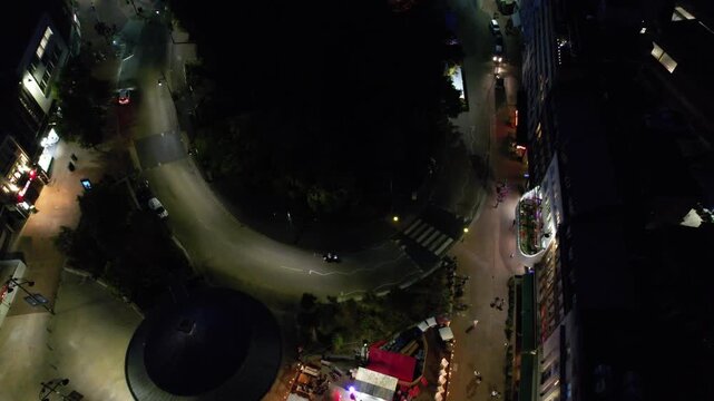 High Angle Night Footage of Illuminated Buildings and Roads with Traffic at Best Tourist Attraction Destination of England at Bournemouth City with Sandy Beach and Ocean of Great Britain, 