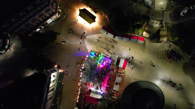 High Angle Night Footage of Illuminated Buildings and Roads with Traffic at Best Tourist Attraction Destination of England at Bournemouth City with Sandy Beach and Ocean of Great Britain, 