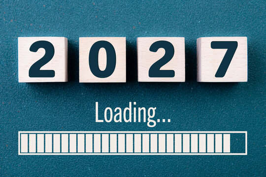 Wooden cube block 2027, countdown to 2027. Loading year to 2027. New year start concept, business, resolutions, goals, inspiration, success, ideas