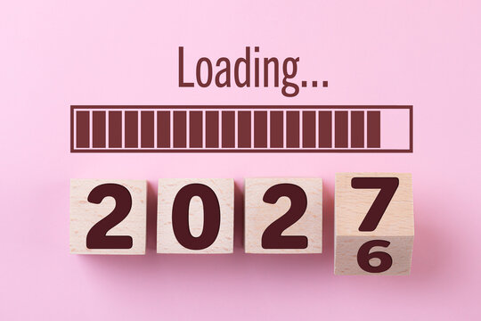 Wooden cube block 2027, countdown to 2027. Loading year to 2027. New year start concept, business, resolutions, goals, inspiration, success, ideas
