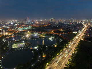 Fototapeta premium Aerial night view of Hanoi skyline, Hoa Binh Park and Ring Road 3