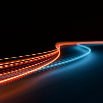 Dynamic luminous lines bend toward the horizon like a futuristic racing track. Intense orange, red and blue highlights create depth, acceleration, motion and a sense of digital speed.