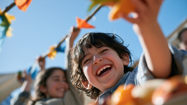 Joyful Children Celebrating Sukkot Festival with Traditional Decorations and Laughter Outdoors