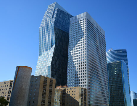 District La Defense in Paris France. It is Europes largest business district with 560 hectares area 72 glass and steel buildings and skyscrapers 