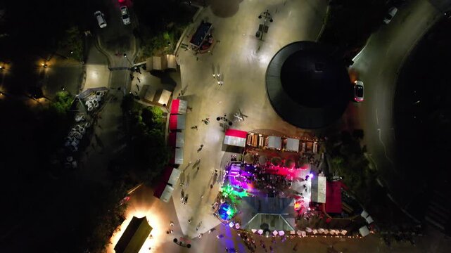 High Angle Night Footage of Illuminated Buildings and Roads with Traffic at Best Tourist Attraction Destination of England at Bournemouth City with Sandy Beach and Ocean of Great Britain, 