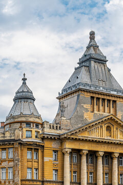 Upper facade and rooftop towers of Anker Palace seen from Deak Ferenc Square in central Budapest, Hungary