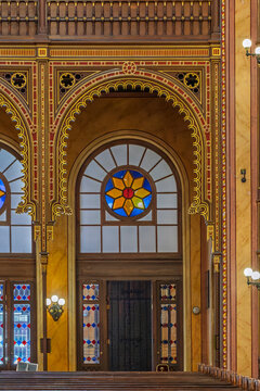 Arched doorway and stained glass window inside Dohany Street Synagogue in the Erzsebetvaros district of Budapest, Hungary