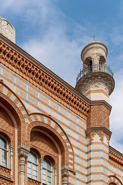 Historic minaret-like corner turret and patterned facade of Rumbach Street Synagogue in Budapest, Hungary