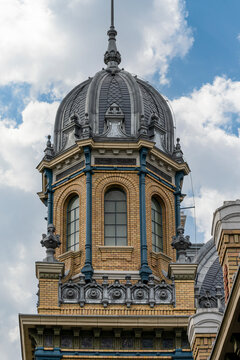 Ornate domed tower with arched windows and brickwork at Nyugati Railway Station in central Budapest, Hungary