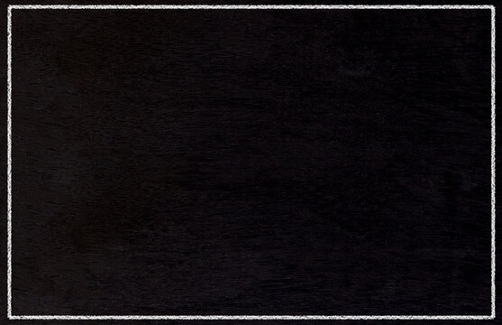 Empty black chalkboard background with white chalk border frame