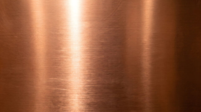 Brushed copper metal background texture with warm rose gold metallic sheen and vertical light reflections