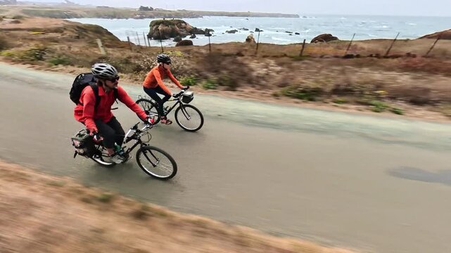 A couple bikes on Noyo Coastal Trail in Fort Bragg California near Mendocino while enjoying ocean views and coastal scenery