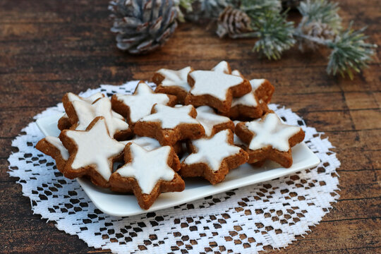 Traditional cinnamon stars on a white plate.