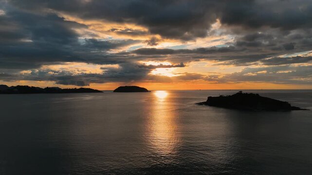 4K Aerial drone view of Sunset Over Playa Penca Bay and Pacific Ocean, Guanacaste, Costa Rica