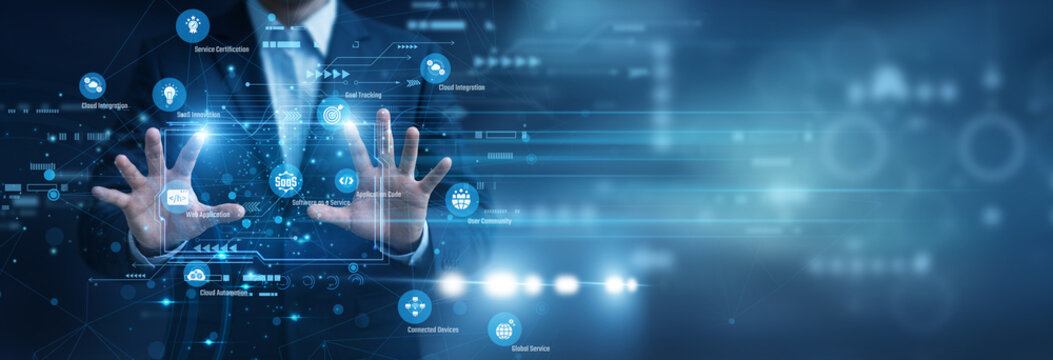 Cloud architect seamlessly scaling subscriptions. Using Hands to optimize Software as a Service platforms on a glowing Virtual Screen. Delivering web applications to global remote clients.