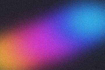 Fototapeta premium Abstract grainy gradient background with vibrant orange purple and blue colors for banners.
