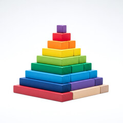 Naklejka premium Vibrant stacked rainbow blocks forming a pyramid shape
