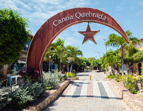 Canoa Quebrada Town Sign Over Pedestrian Walkway - Canoa Quebrada, Ceara, Brazil. August, 05, 2026