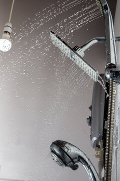 Water sprays out of various showerheads