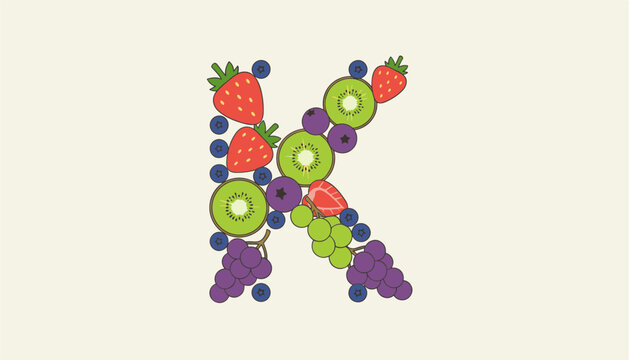 Capital letter K is creatively constructed using a vibrant assortment of fresh strawberries, kiwi slices, and grapes.