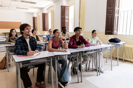 Diverse students learning together during engaging classroom lesson