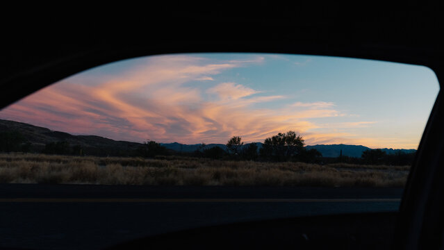 Sunset view through car window